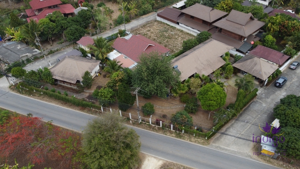 Lovely property with 2 homes on a large plot of land with many fruit trees at Muang Kaew, Mae Rim